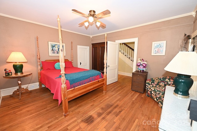 616 N Deal Ave, Newton, NC 28658 - bedroom featuring light wood-style floors, crown molding, ceiling fan, and baseboards