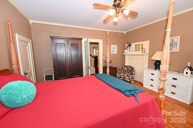 616 N Deal Ave, Newton, NC 28658 - bedroom featuring wood finished floors, ornamental molding, and ceiling fan
