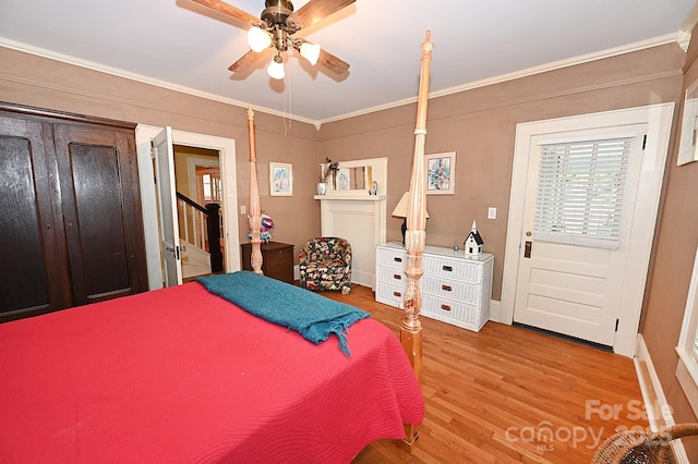 616 N Deal Ave, Newton, NC 28658 - bedroom with wood finished floors, crown molding, and a ceiling fan
