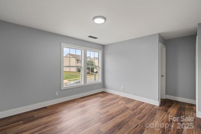 3124 Pikes Peak Dr, Gastonia, NC 28052 - unfurnished room with wood finished floors and baseboards