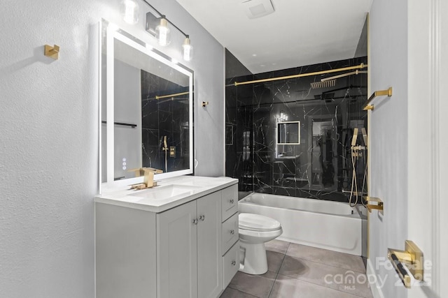 3124 Pikes Peak Dr, Gastonia, NC 28052 - bathroom featuring vanity, toilet, tile patterned floors, shower / washtub combination, and a textured wall