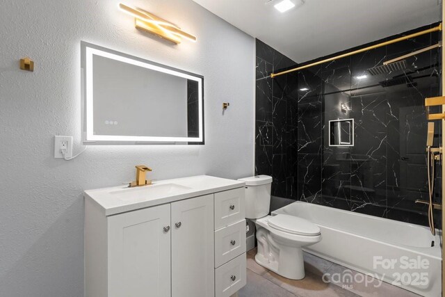 3124 Pikes Peak Dr, Gastonia, NC 28052 - full bath with toilet, vanity, a textured wall, and a combined bath / shower with marble appearance
