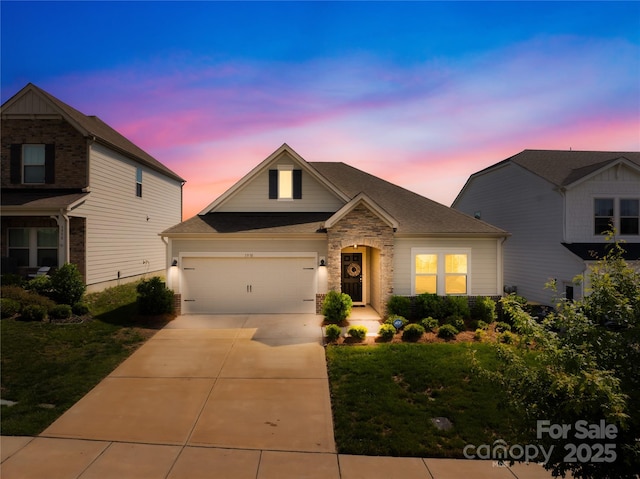 3938 Isenhour Rd, Kannapolis, NC 28081 - view of front of home featuring driveway, an attached garage, and a front lawn