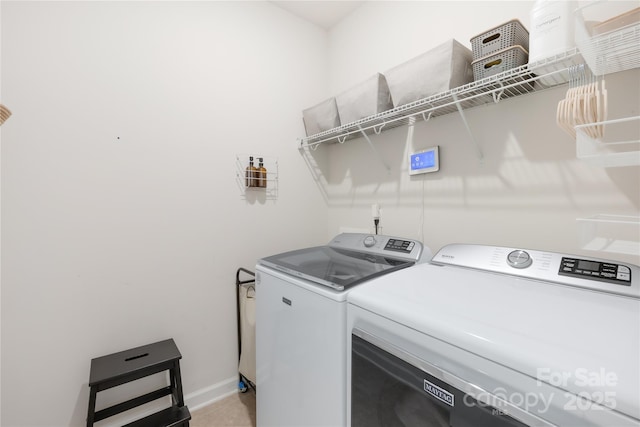 3938 Isenhour Rd, Kannapolis, NC 28081 - washroom with washing machine and clothes dryer and baseboards