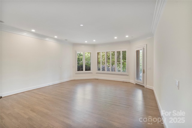 8721 Lake Challis Ln, Charlotte, NC 28226 - spare room with ornamental molding, light wood-type flooring, and recessed lighting