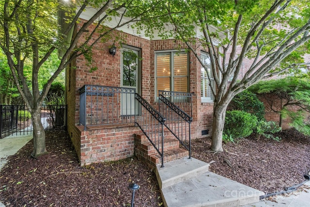 8721 Lake Challis Ln, Charlotte, NC 28226 - doorway to property featuring brick siding