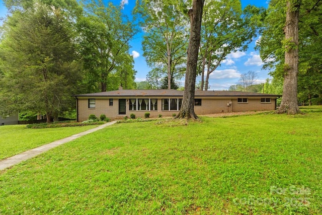 7022 Lakeside Dr, Charlotte, NC 28215 - view of front of home with a front yard and brick siding