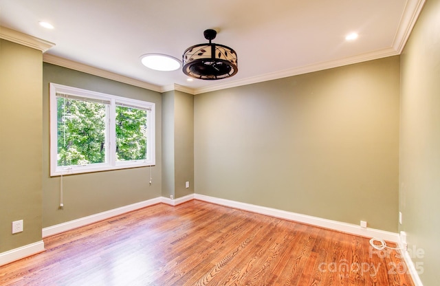 305 E High Point Ln, Hendersonville, NC 28791 - unfurnished room featuring light wood finished floors, crown molding, baseboards, and recessed lighting