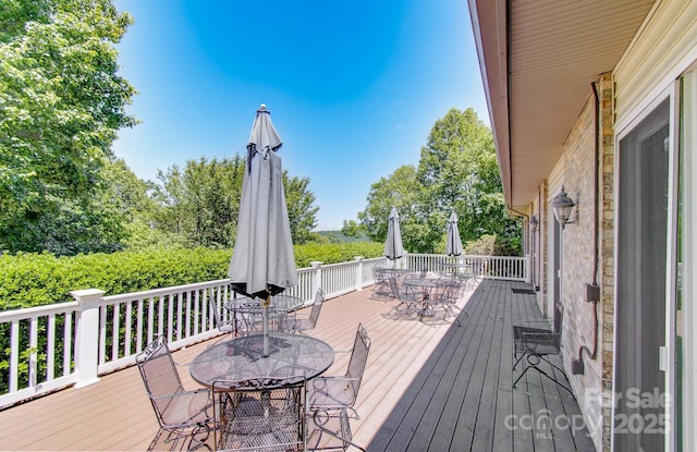 305 E High Point Ln, Hendersonville, NC 28791 - wooden terrace featuring outdoor dining area