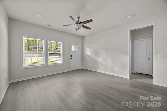 1723 Rhyneland Cir, Gastonia, NC 28054 - unfurnished room featuring wood finished floors, a ceiling fan, and a smoke detector