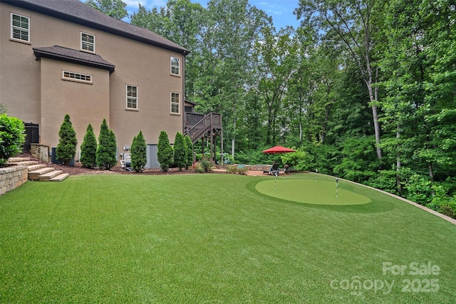 117 Walking Horse Trl, Davidson, NC 28036 - view of green lawn with stairs and a putting green