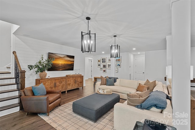 117 Walking Horse Trl, Davidson, NC 28036 - living area featuring wood finished floors, recessed lighting, stairs, and a chandelier