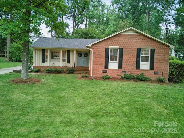 2026 Knell Dr, Charlotte, NC 28212 - ranch-style home with a front lawn, a porch, brick siding, board and batten siding, and a shingled roof