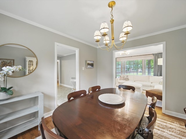 2026 Knell Dr, Charlotte, NC 28212 - dining room with a chandelier, crown molding, wood finished floors, and baseboards