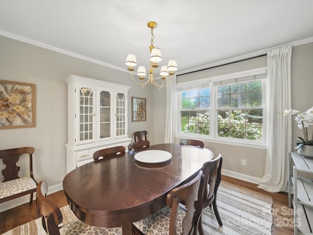 2026 Knell Dr, Charlotte, NC 28212 - dining room featuring a chandelier, wood finished floors, baseboards, and ornamental molding