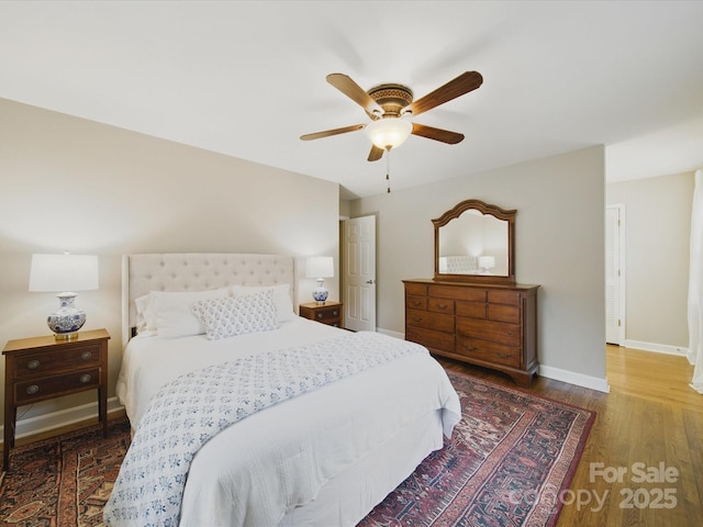2026 Knell Dr, Charlotte, NC 28212 - bedroom with wood finished floors, baseboards, and a ceiling fan