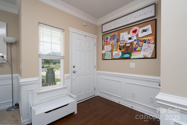 4915 Juniper Grove Ct SW, Concord, NC 28027 - entryway with ornamental molding, a wainscoted wall, dark wood finished floors, and a decorative wall