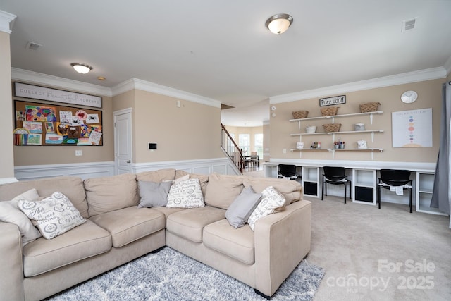 4915 Juniper Grove Ct SW, Concord, NC 28027 - living room with crown molding, stairway, wainscoting, and light colored carpet