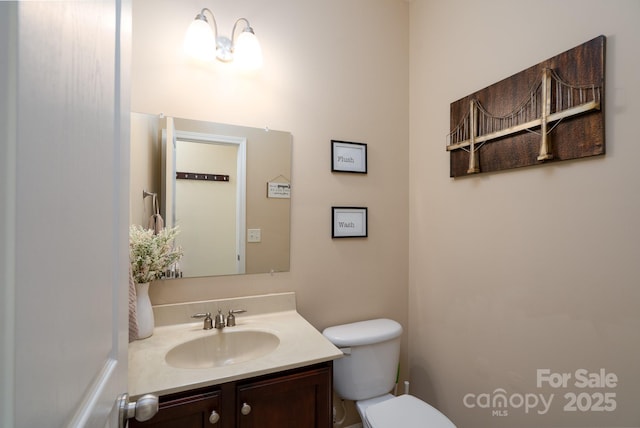 4915 Juniper Grove Ct SW, Concord, NC 28027 - bathroom featuring toilet and vanity