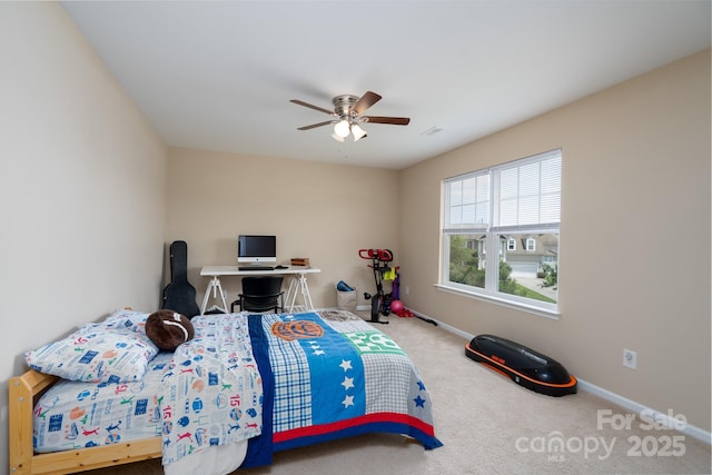 4915 Juniper Grove Ct SW, Concord, NC 28027 - carpeted bedroom with baseboards and a ceiling fan