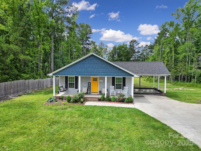 2302 Douglas Rd, Lancaster, SC 29720 - view of front of home featuring covered porch, concrete driveway, and a carport