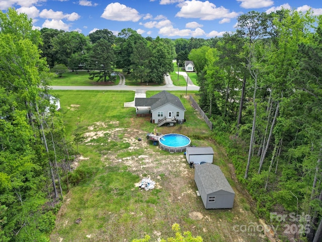 2302 Douglas Rd, Lancaster, SC 29720 - view from above of property featuring a pool and a heavily wooded area