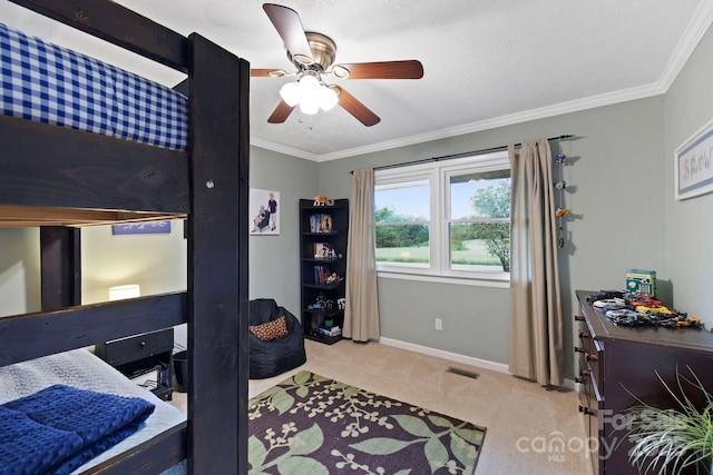 242 Pattys Chapel Rd, Fletcher, NC 28732 - bedroom featuring light colored carpet, baseboards, crown molding, and a ceiling fan