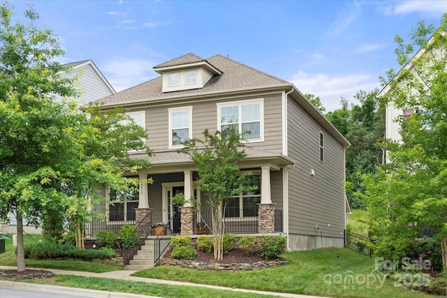 15515 Laverack Ln, Davidson, NC 28036 - american foursquare style home with covered porch and a front lawn