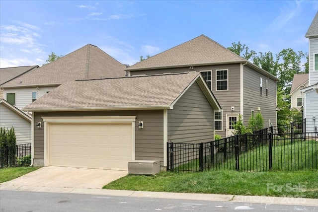 15515 Laverack Ln, Davidson, NC 28036 - view of front of home featuring driveway, an attached garage, and roof with shingles