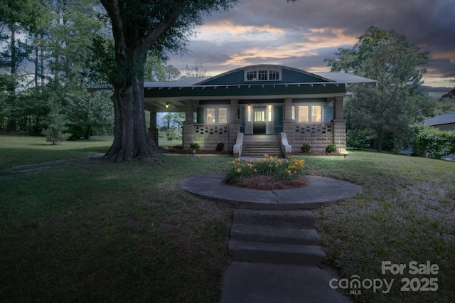409 S Grove St, Lincolnton, NC 28092 - view of front of property featuring a yard, a porch, and stairway