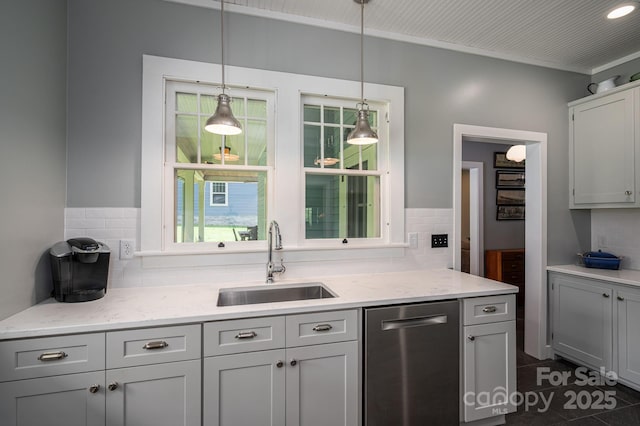 409 S Grove St, Lincolnton, NC 28092 - kitchen featuring stainless steel dishwasher, a sink, decorative backsplash, decorative light fixtures, and light stone counters