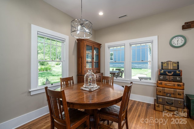 409 S Grove St, Lincolnton, NC 28092 - dining space with baseboards, plenty of natural light, wood finished floors, and recessed lighting
