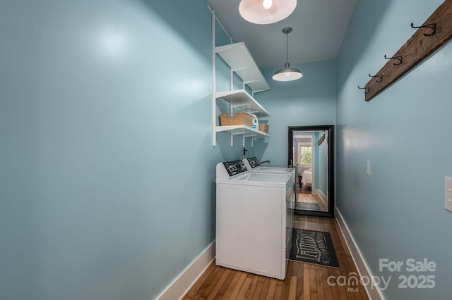 409 S Grove St, Lincolnton, NC 28092 - washroom featuring independent washer and dryer, hardwood / wood-style flooring, and baseboards