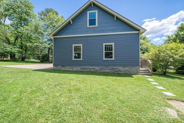 409 S Grove St, Lincolnton, NC 28092 - view of home's exterior with a lawn