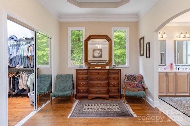 201 Kawani Ln, Brevard, NC 28712 - living area with arched walkways, light wood-style floors, healthy amount of natural light, ornamental molding, and baseboards