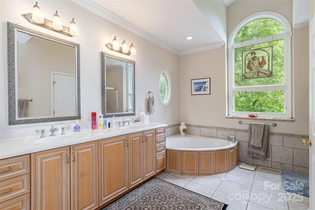 201 Kawani Ln, Brevard, NC 28712 - bathroom with double vanity, a bath, crown molding, tile patterned floors, and recessed lighting