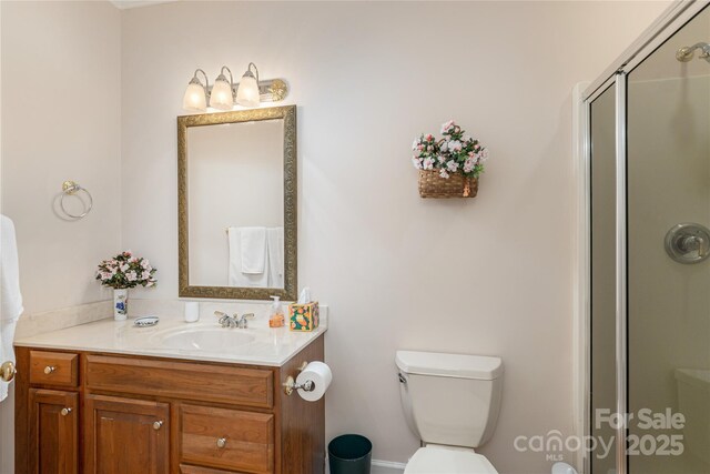 201 Kawani Ln, Brevard, NC 28712 - bathroom featuring vanity, a stall shower, and toilet