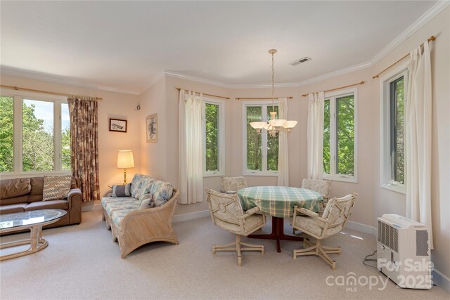 201 Kawani Ln, Brevard, NC 28712 - dining area featuring carpet, baseboards, ornamental molding, and a chandelier