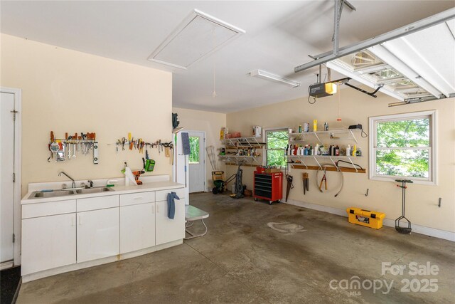 201 Kawani Ln, Brevard, NC 28712 - garage featuring a sink and a garage door opener