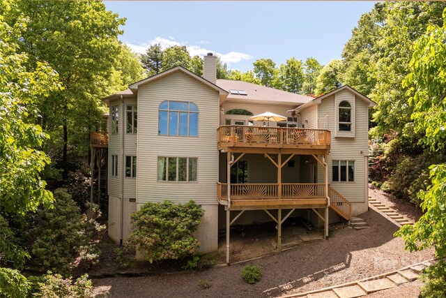 201 Kawani Ln, Brevard, NC 28712 - rear view of house with a chimney, a wooden deck, and a balcony