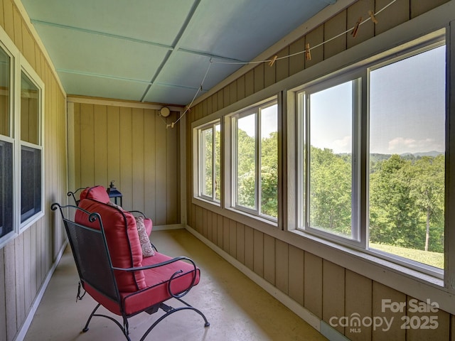 90 Coates Rd, Marshall, NC 28753 - sunroom / solarium with wooden walls and concrete flooring