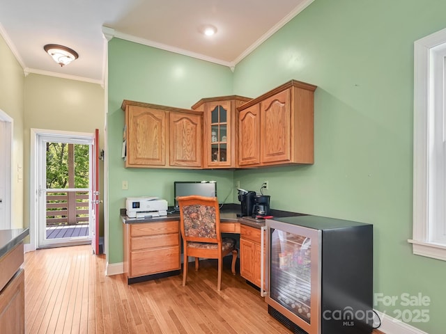 90 Coates Rd, Marshall, NC 28753 - home office featuring ornamental molding, beverage cooler, light wood finished floors, and baseboards
