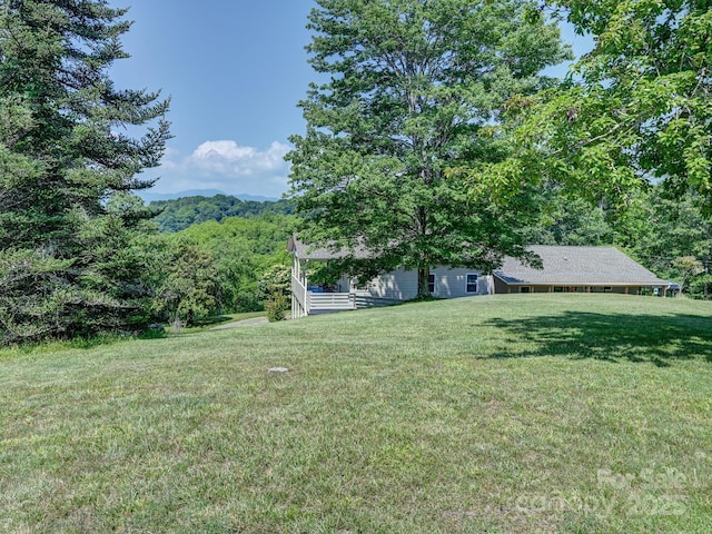 90 Coates Rd, Marshall, NC 28753 - view of green lawn with a wooded view