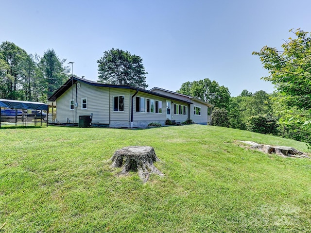 90 Coates Rd, Marshall, NC 28753 - rear view of house featuring a yard and cooling unit