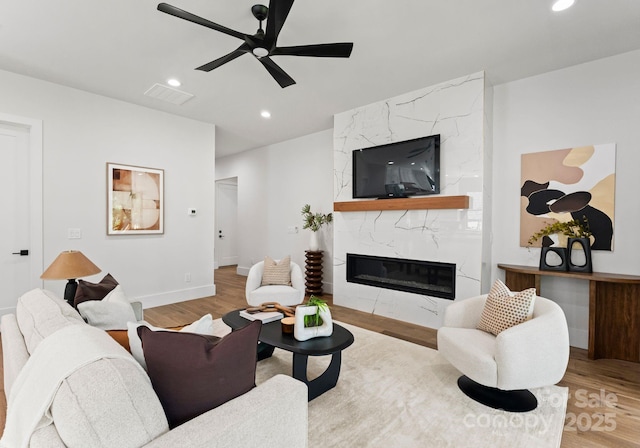 1626 Burtonwood Cir, Charlotte, NC 28212 - living area with ceiling fan, wood finished floors, recessed lighting, and a premium fireplace