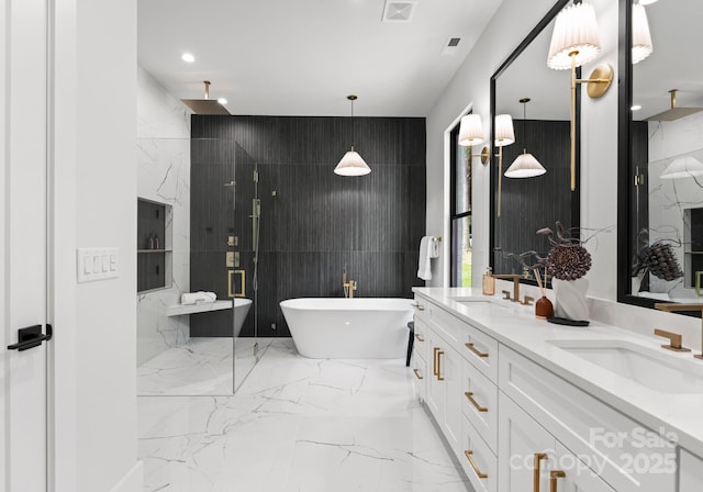 1626 Burtonwood Cir, Charlotte, NC 28212 - bathroom featuring marble tiled flooring, a marble finish shower, double vanity, a freestanding bath, and recessed lighting