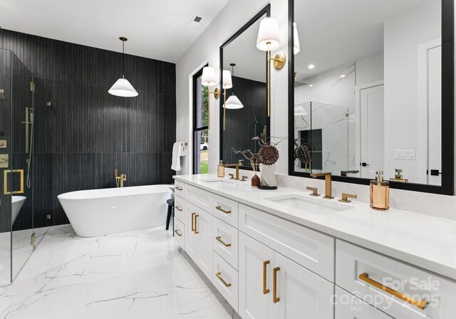 1626 Burtonwood Cir, Charlotte, NC 28212 - full bath featuring a marble finish shower, a freestanding tub, double vanity, and marble tiled flooring