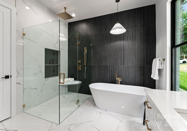 1626 Burtonwood Cir, Charlotte, NC 28212 - full bath featuring marble tiled flooring, a marble finish shower, a soaking tub, vanity, and tile walls