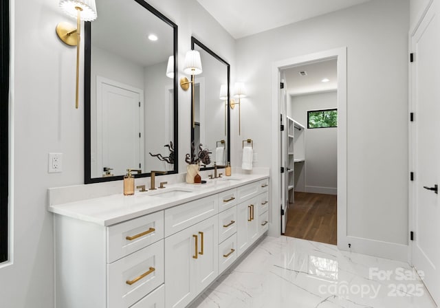 1626 Burtonwood Cir, Charlotte, NC 28212 - bathroom with double vanity, recessed lighting, and marble finish flooring