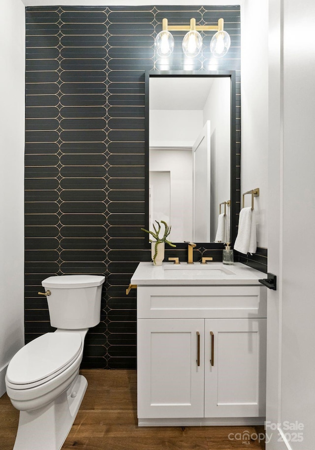 1626 Burtonwood Cir, Charlotte, NC 28212 - half bathroom featuring vanity and wood finished floors